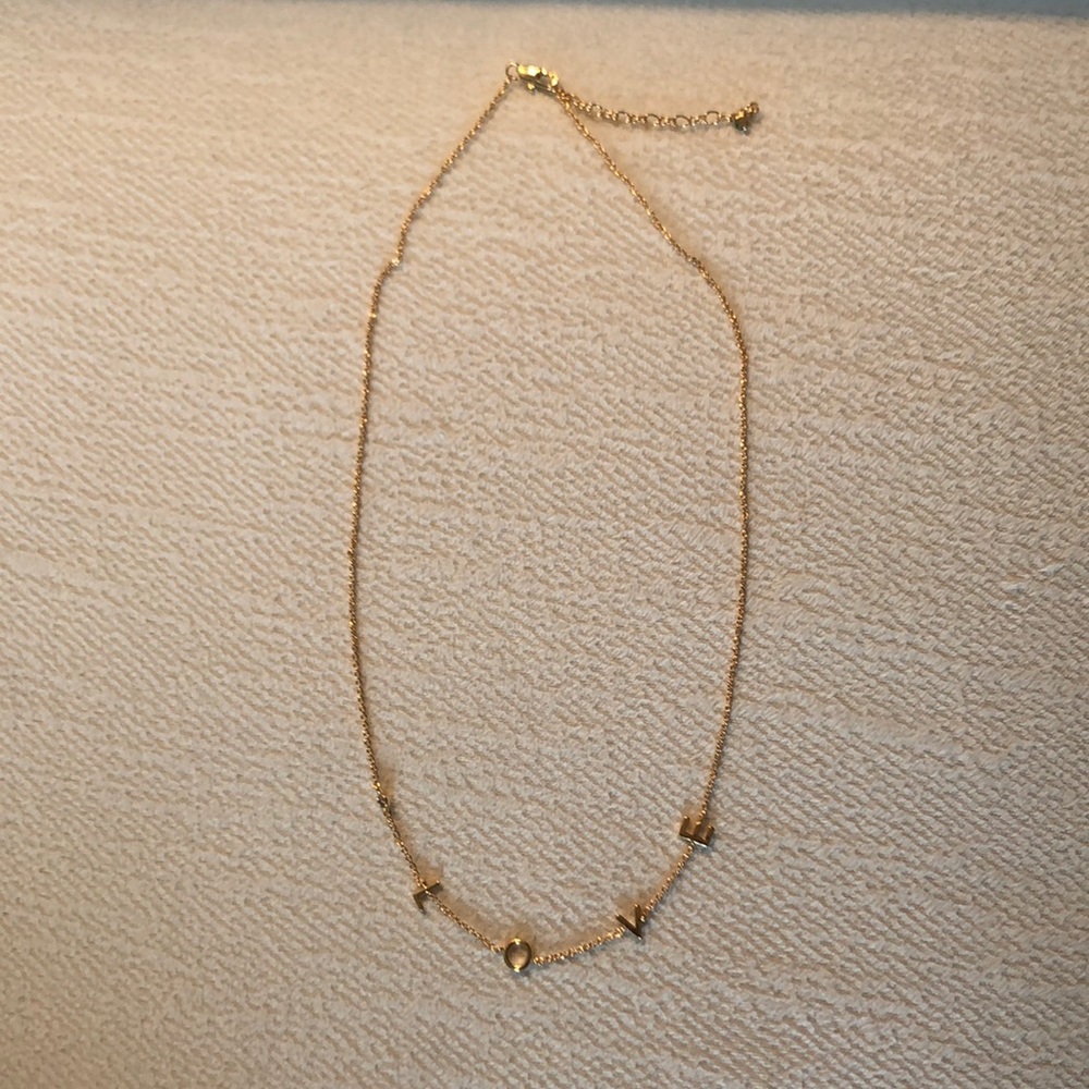 Gold love necklace